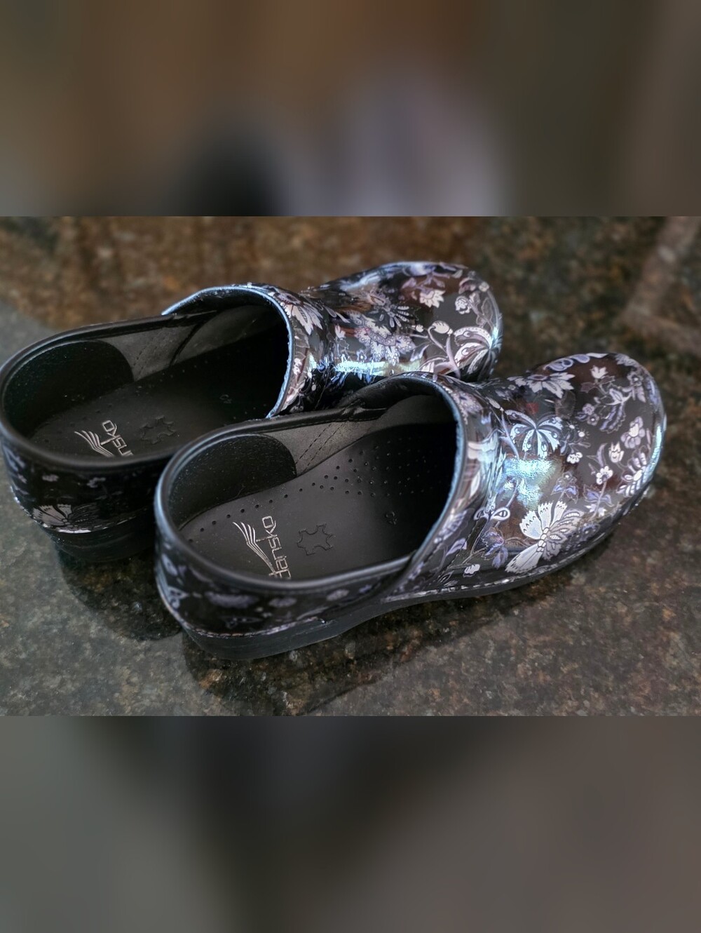 Dansko Black Patent Floral Clogs with Silver Accents